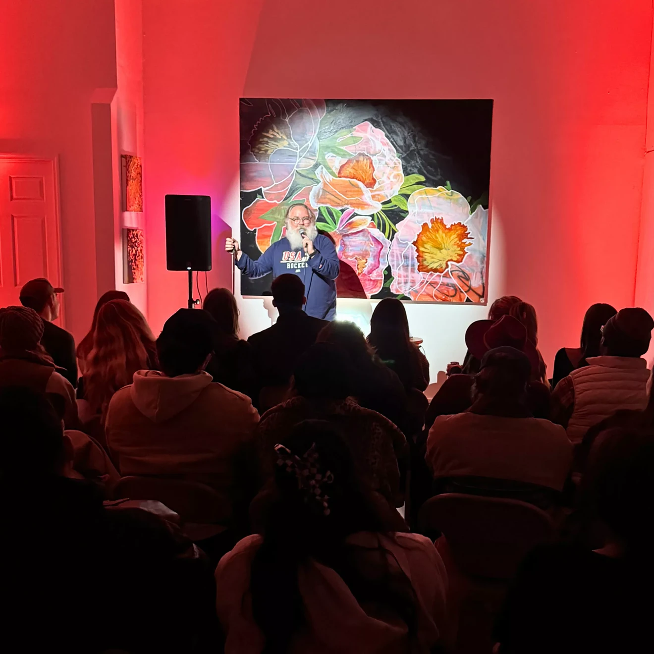 Atlanta-based comedian Ian Aber performing at a comedy show at The Stables